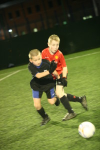 Kids playing football